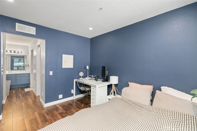 8718 E Indian Hills Rd Unit J, Orange, CA 92869 - bedroom with dark wood-style flooring and recessed lighting