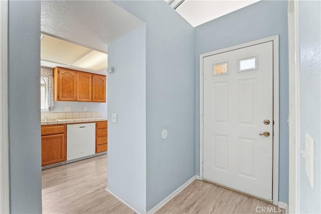 19192 Garcelon Ct, Apple Valley, CA 92308 - entryway with light wood-type flooring and plenty of natural light