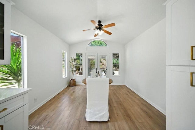 24322 Via Las Junitas, Murrieta, CA 92562 - dining room with french doors, light wood-style floors, a ceiling fan, and vaulted ceiling