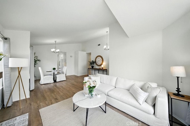 24322 Via Las Junitas, Murrieta, CA 92562 - living area with a chandelier and wood finished floors