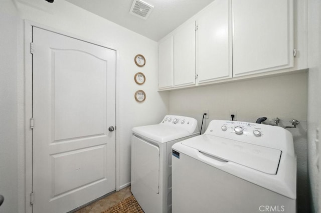24322 Via Las Junitas, Murrieta, CA 92562 - washroom featuring washer and dryer, cabinet space, and light tile patterned floors