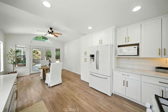 24322 Via Las Junitas, Murrieta, CA 92562 - kitchen featuring white appliances, french doors, light countertops, ceiling fan, and white cabinetry