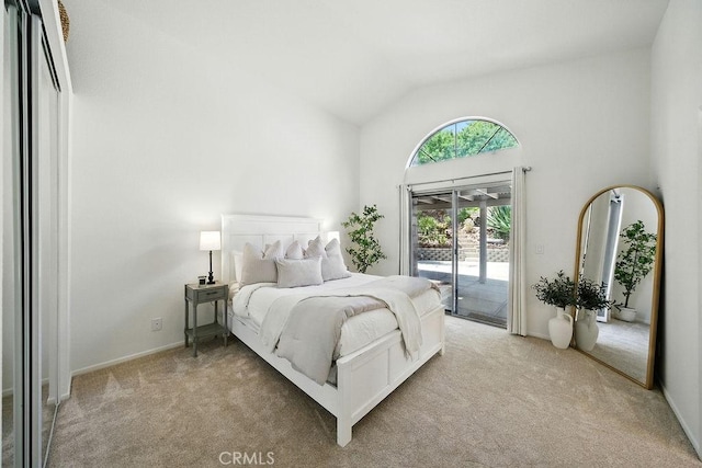 24322 Via Las Junitas, Murrieta, CA 92562 - bedroom with access to exterior, light colored carpet, and vaulted ceiling