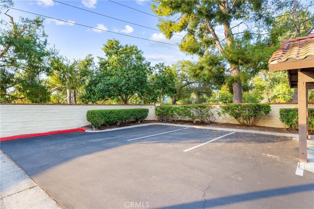 25521 Indian Hill Ln Unit L, Laguna Hills, CA 92653 - view of uncovered parking lot