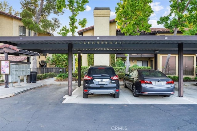 25521 Indian Hill Ln Unit L, Laguna Hills, CA 92653 - covered parking lot with mail area