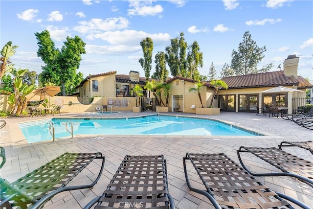 25521 Indian Hill Ln Unit L, Laguna Hills, CA 92653 - community pool featuring a patio area