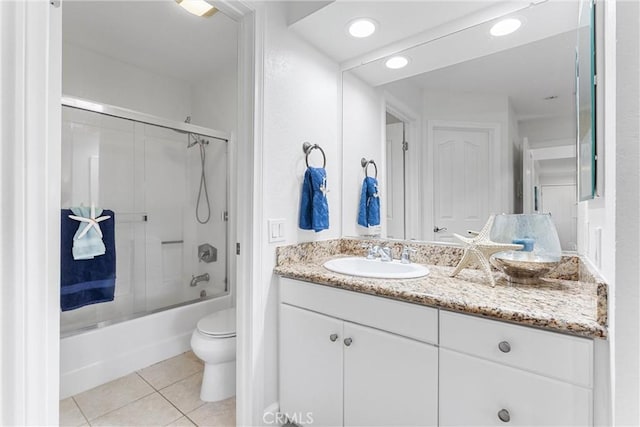 25521 Indian Hill Ln Unit L, Laguna Hills, CA 92653 - bathroom featuring vanity, tile patterned flooring, combined bath / shower with glass door, and recessed lighting