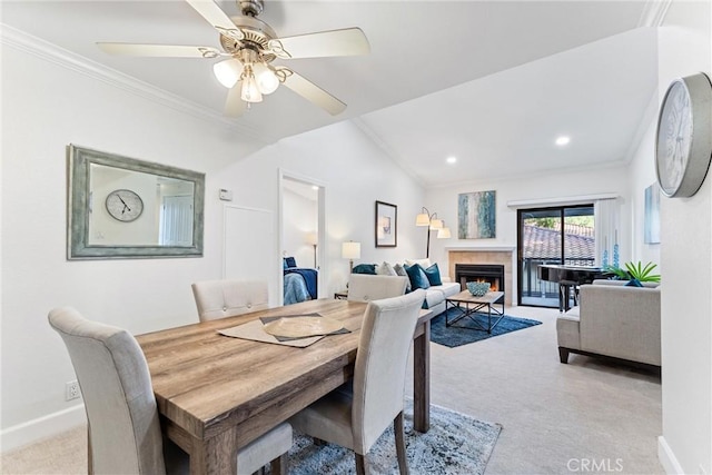 25521 Indian Hill Ln Unit L, Laguna Hills, CA 92653 - dining area featuring light carpet, a fireplace, ornamental molding, ceiling fan, and recessed lighting