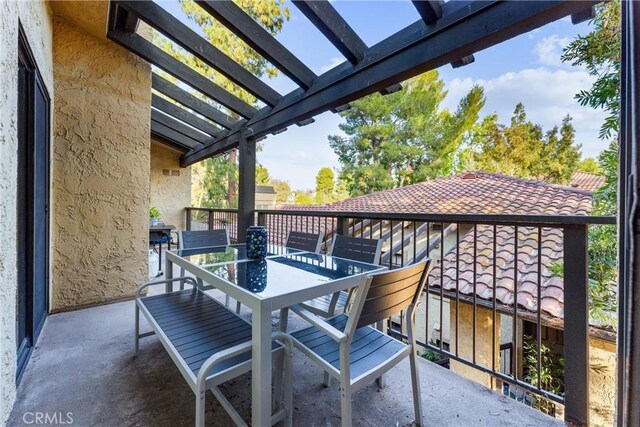 25521 Indian Hill Ln Unit L, Laguna Hills, CA 92653 - view of patio featuring outdoor dining area and a pergola
