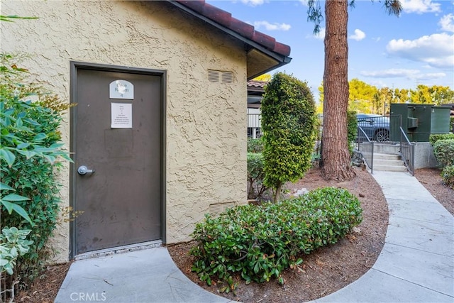 25521 Indian Hill Ln Unit L, Laguna Hills, CA 92653 - entrance to property featuring stucco siding