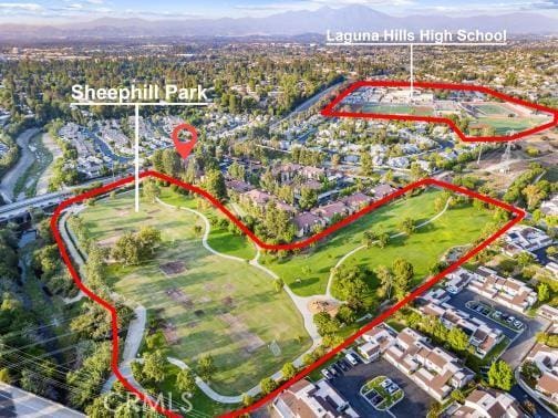 25521 Indian Hill Ln Unit L, Laguna Hills, CA 92653 - aerial view of property and surrounding area featuring property parcel outlined