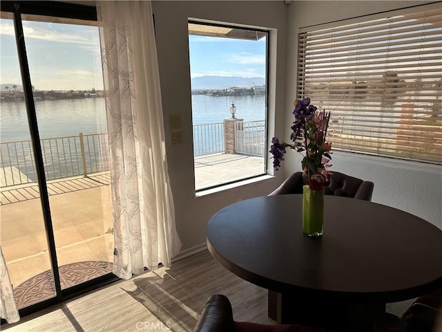 13915 Spring Valley Pkwy, Victorville, CA 92395 - dining area with a water view and wood finished floors