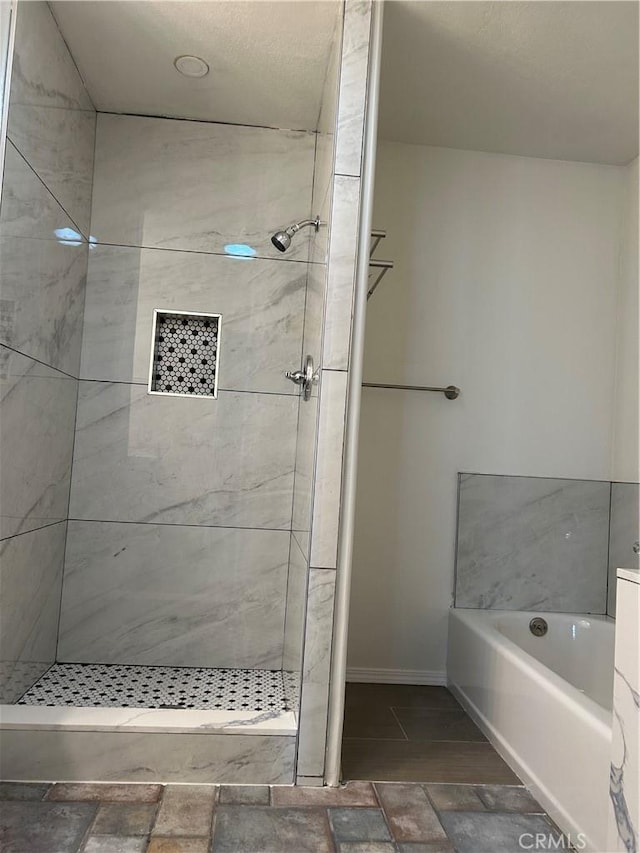 13915 Spring Valley Pkwy, Victorville, CA 92395 - full bathroom featuring tiled shower and a bath