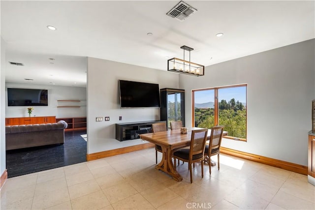 24410 Mulholland, Calabasas, CA 91302 - dining space with a chandelier and recessed lighting