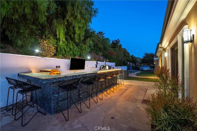 24410 Mulholland, Calabasas, CA 91302 - view of patio featuring an outdoor kitchen