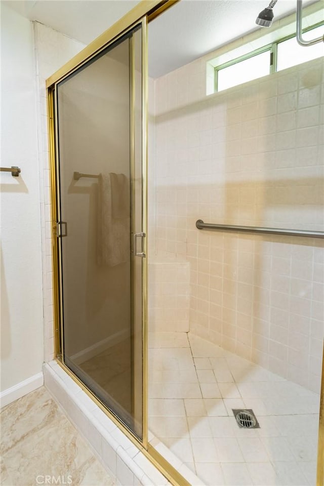 903 San Pablo Ave, Merced, CA 95348 - bathroom with a stall shower and tile patterned floors