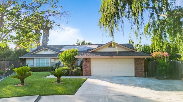903 San Pablo Ave, Merced, CA 95348 - ranch-style home with driveway, brick siding, and a garage