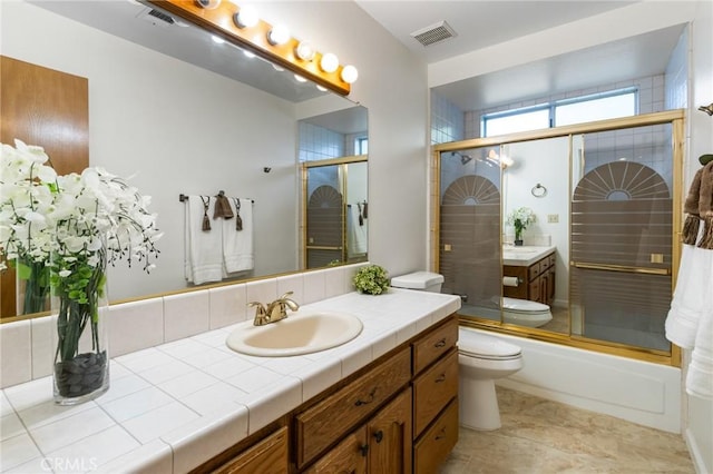 903 San Pablo Ave, Merced, CA 95348 - full bath featuring vanity and combined bath / shower with glass door