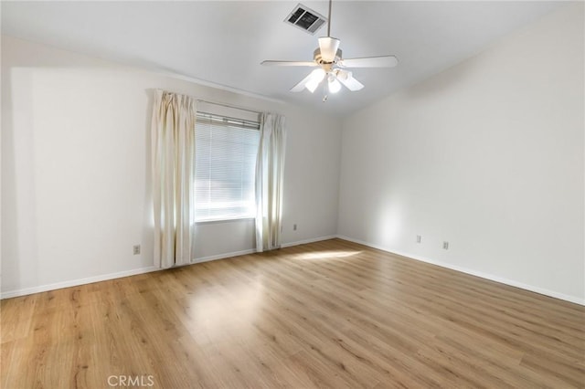 903 San Pablo Ave, Merced, CA 95348 - empty room with light wood-style floors, a ceiling fan, and vaulted ceiling