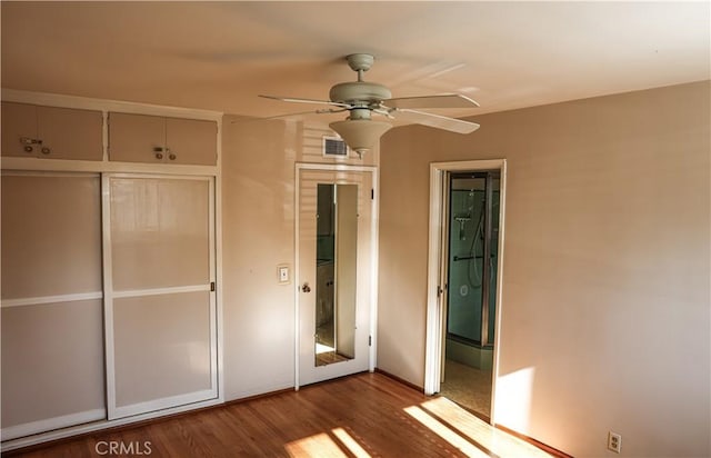 1230 N Mountain Ave, Claremont, CA 91711 - unfurnished bedroom with wood finished floors, a closet, and a ceiling fan