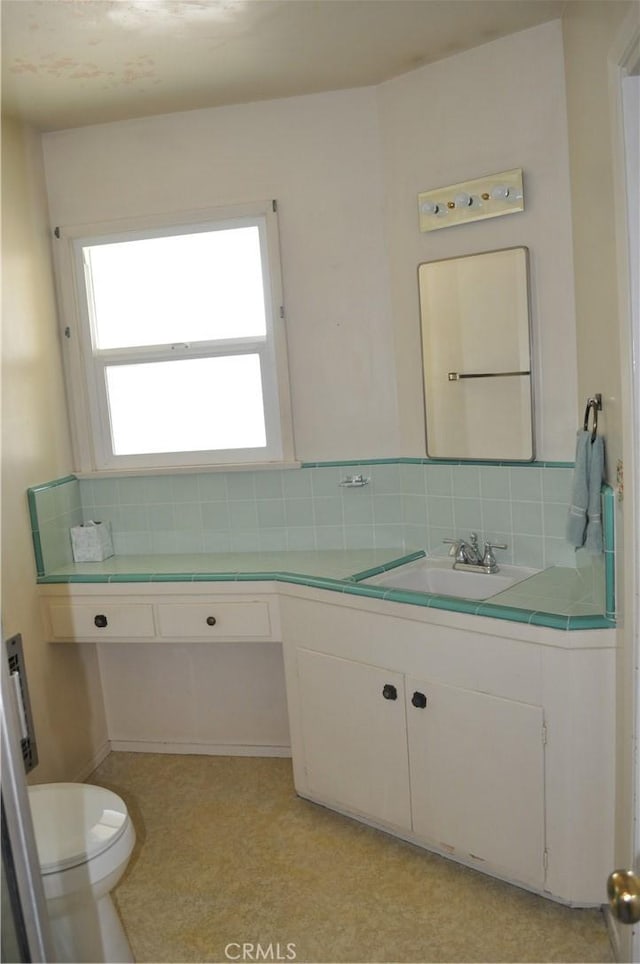 1230 N Mountain Ave, Claremont, CA 91711 - bathroom with decorative backsplash and vanity