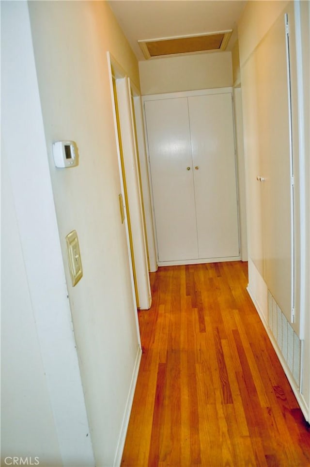 1230 N Mountain Ave, Claremont, CA 91711 - hall with light wood-style floors and attic access