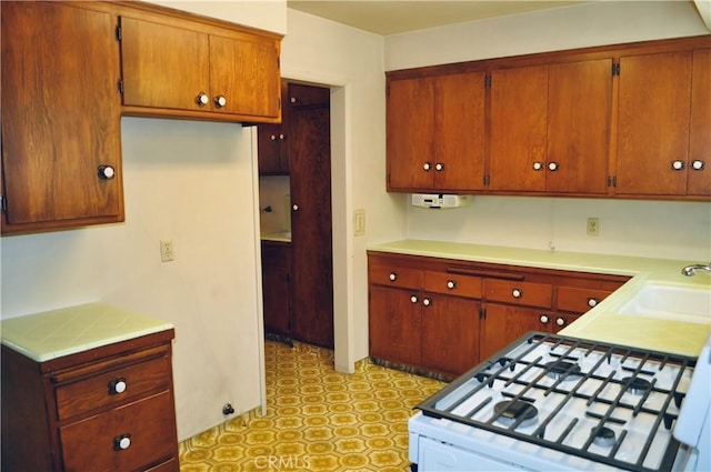 1230 N Mountain Ave, Claremont, CA 91711 - kitchen featuring white gas range and light flooring
