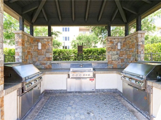 5429 Strand Unit 101, Hawthorne, CA 90250 - view of patio featuring a gazebo and exterior kitchen