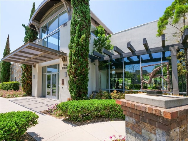 5429 Strand Unit 101, Hawthorne, CA 90250 - view of patio featuring a pergola and french doors