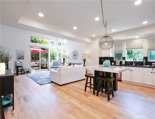 5429 Strand Unit 101, Hawthorne, CA 90250 - living room with recessed lighting, light wood-style flooring, and healthy amount of natural light