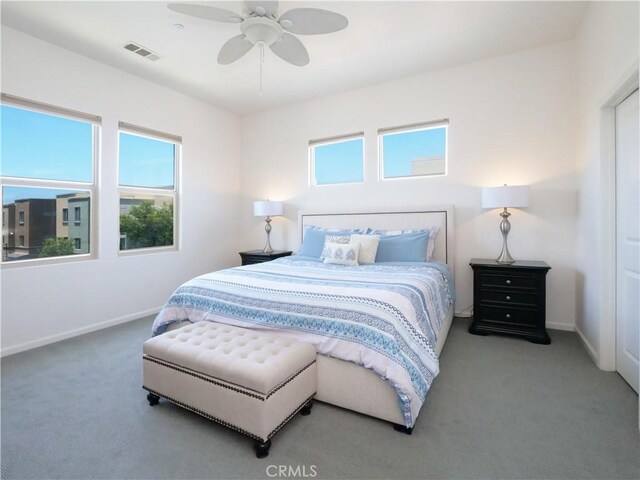 5429 Strand Unit 101, Hawthorne, CA 90250 - carpeted bedroom with multiple windows and ceiling fan