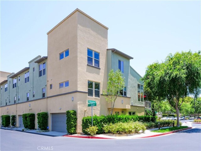 5429 Strand Unit 101, Hawthorne, CA 90250 - view of building exterior with a garage