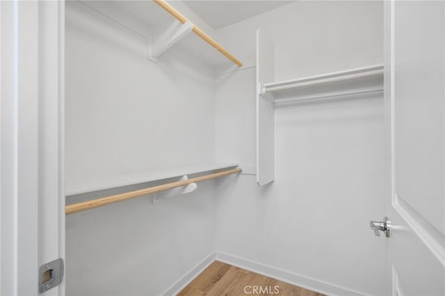 1016 W Baseline Rd, Claremont, CA 91711 - walk in closet with wood finished floors