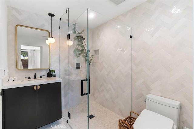 20 Whistling Isle, Irvine, CA 92614 - full bathroom featuring tile walls, a shower stall, and vanity