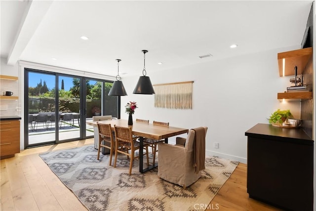 20 Whistling Isle, Irvine, CA 92614 - dining room with light wood finished floors, beamed ceiling, and recessed lighting