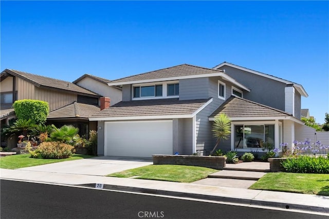 20 Whistling Isle, Irvine, CA 92614 - traditional home featuring concrete driveway, a garage, stucco siding, and a tile roof