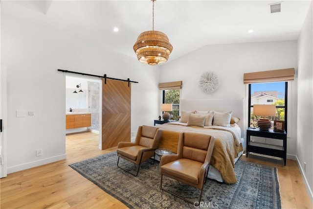 20 Whistling Isle, Irvine, CA 92614 - bedroom featuring a barn door, light wood-style floors, lofted ceiling, ensuite bath, and a chandelier