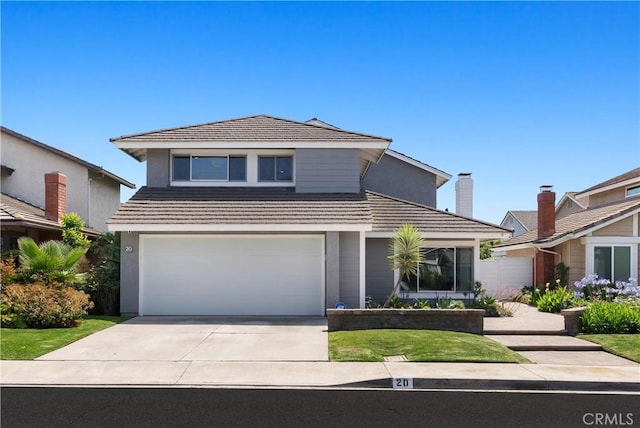 20 Whistling Isle, Irvine, CA 92614 - traditional home with an attached garage, driveway, stucco siding, and a tile roof