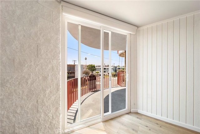 240 W Queen St Unit 10, Inglewood, CA 90301 - doorway featuring wood finished floors and baseboards