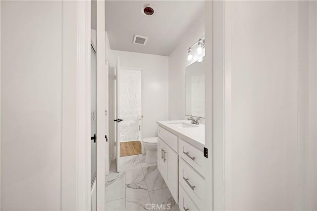 240 W Queen St Unit 10, Inglewood, CA 90301 - bathroom with marble finish floors, vanity, and a shower