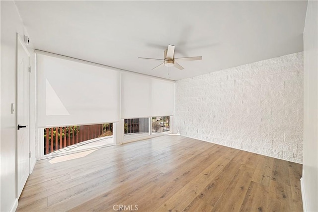 240 W Queen St Unit 10, Inglewood, CA 90301 - unfurnished living room with a ceiling fan and wood finished floors