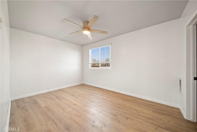 240 W Queen St Unit 10, Inglewood, CA 90301 - unfurnished room featuring ceiling fan, wood finished floors, and concrete block wall