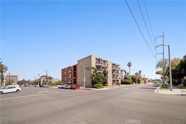240 W Queen St Unit 10, Inglewood, CA 90301 - view of asphalt street with curbs, street lights, and sidewalks