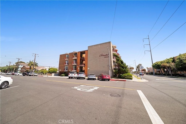 240 W Queen St Unit 10, Inglewood, CA 90301 - view of asphalt road with curbs, sidewalks, and street lights