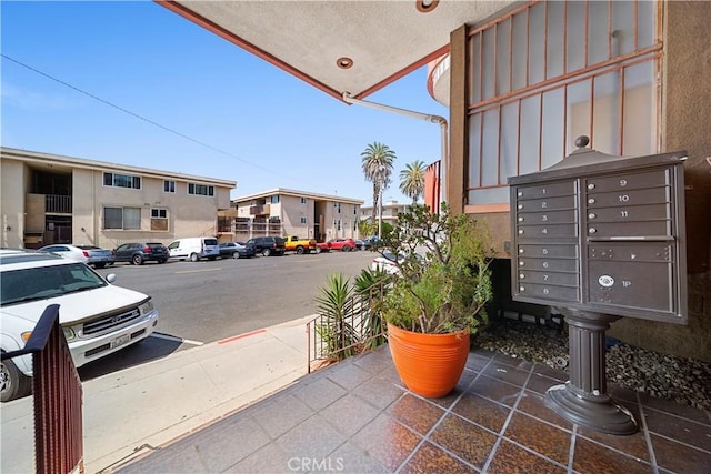 240 W Queen St Unit 10, Inglewood, CA 90301 - view of community with mail area, uncovered parking, and a residential view