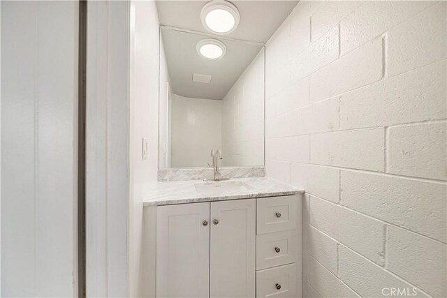 240 W Queen St Unit 10, Inglewood, CA 90301 - bathroom featuring vanity and concrete block wall