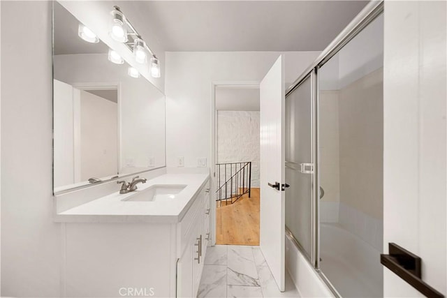 240 W Queen St Unit 10, Inglewood, CA 90301 - bathroom with vanity, marble finish flooring, and enclosed tub / shower combo