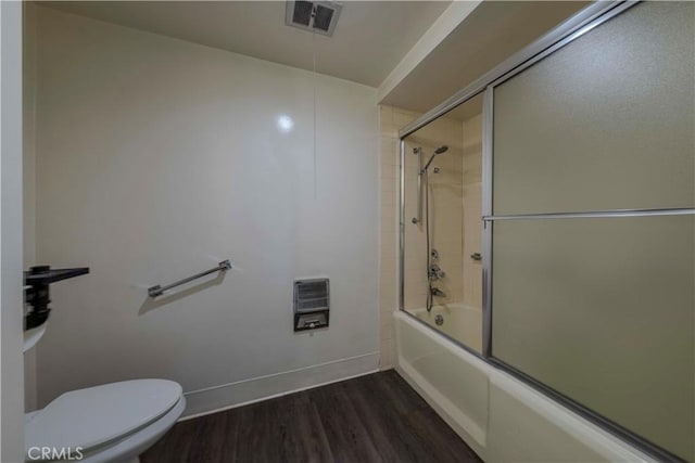 368 Avenida Castilla Unit B, Laguna Woods, CA 92637 - bathroom with heating unit, enclosed tub / shower combo, and wood finished floors