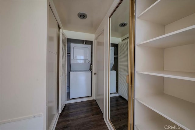 368 Avenida Castilla Unit B, Laguna Woods, CA 92637 - corridor featuring stacked washer / drying machine and dark wood-type flooring