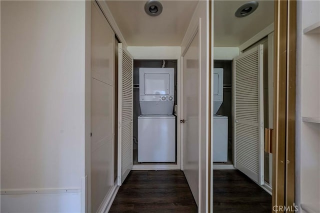 368 Avenida Castilla Unit B, Laguna Woods, CA 92637 - hall featuring estacked washer and dryer and dark wood-type flooring